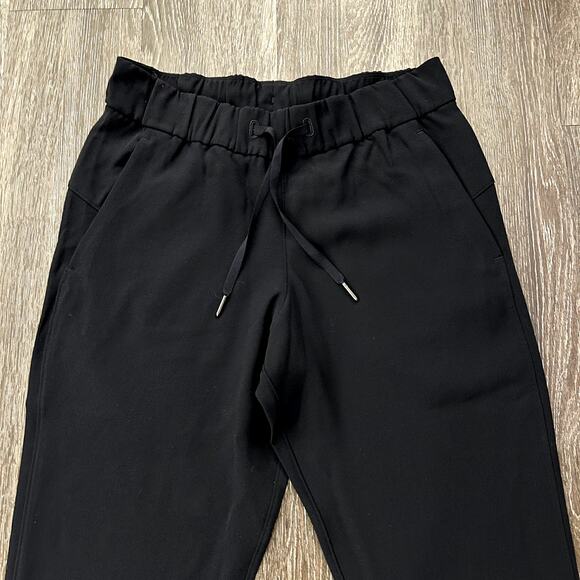 EUC Lululemon On the Fly 7/8 Pant Stretch High-Rise Black Sz 6 Minimalist Jogger - Picture 14 of 16